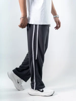 photography of Ash Dual Stripe Sweatpants isolated on a clean background.