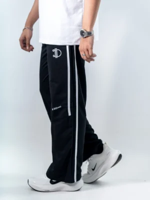 photography of Black Dual Stripe Sweatpants isolated on a clean background.