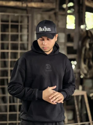 photography of 𝐒𝐨𝐥𝐢𝐝 𝐁𝐥𝐚𝐜𝐤 | Hoodie isolated on a clean background.