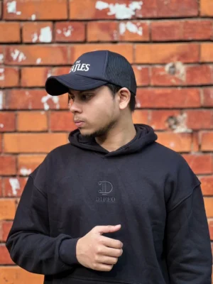 photography of 𝐒𝐨𝐥𝐢𝐝 𝐁𝐥𝐚𝐜𝐤 | Hoodie isolated on a clean background.